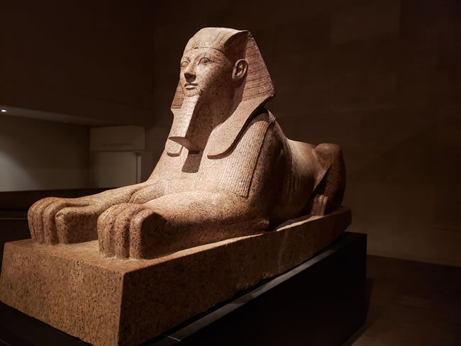 statue of Egyptian Queen Hapshetsut at the Met Museum features as a sitting Lioness